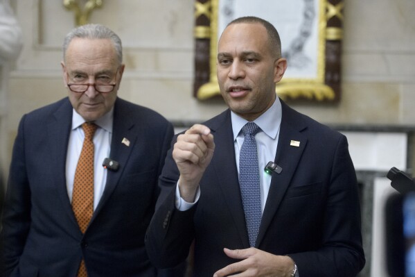 House Minority Leader Hakeem Jeffries, D-N.Y., right, is joined by Senate Minority Leader Chuck Schumer, D-N.Y., for a press conference in Statuary Hall at the Capitol, Feb. 12, 2025, in Washington. (AP Photo/Rod Lamkey, Jr., File)